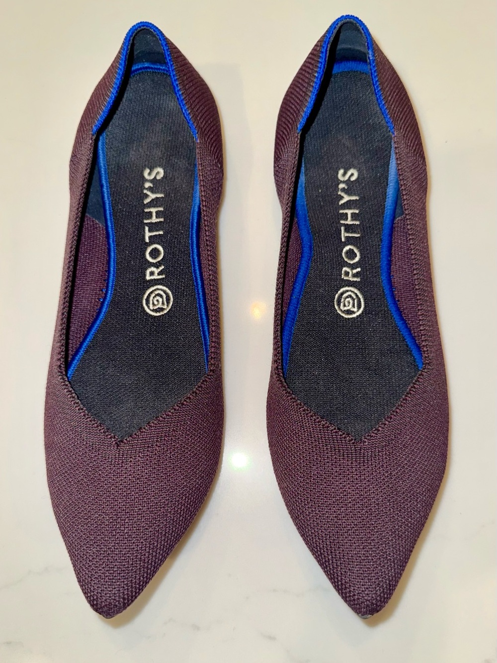Rothy’s Pointed Toe Flats in Plum
